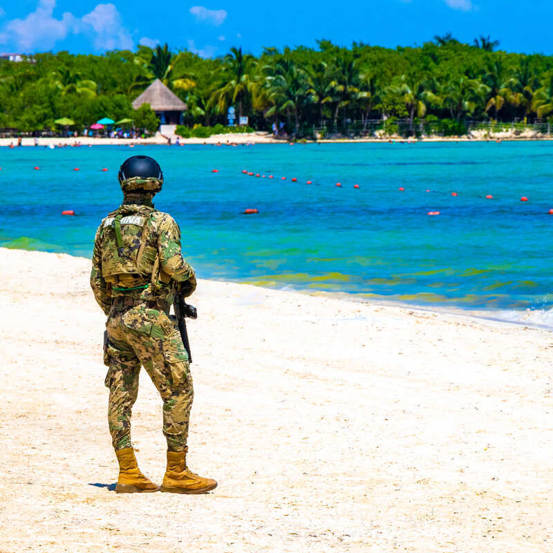 Mexico National Guard Officer Patrolling A Beach Near Cancun, Latin America