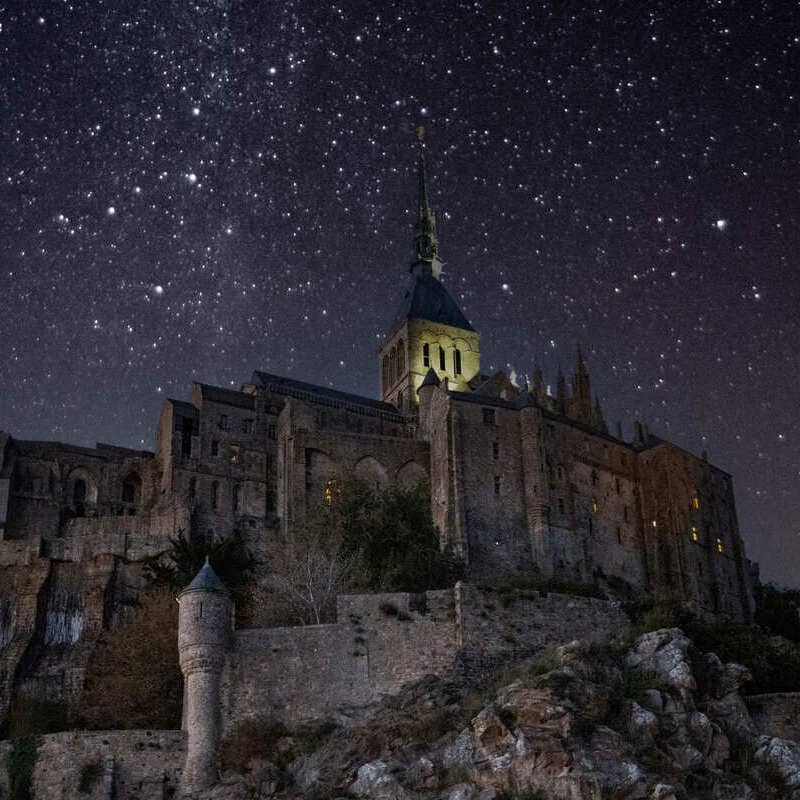 Mont Saint Michel Seen During A Starry Night, France