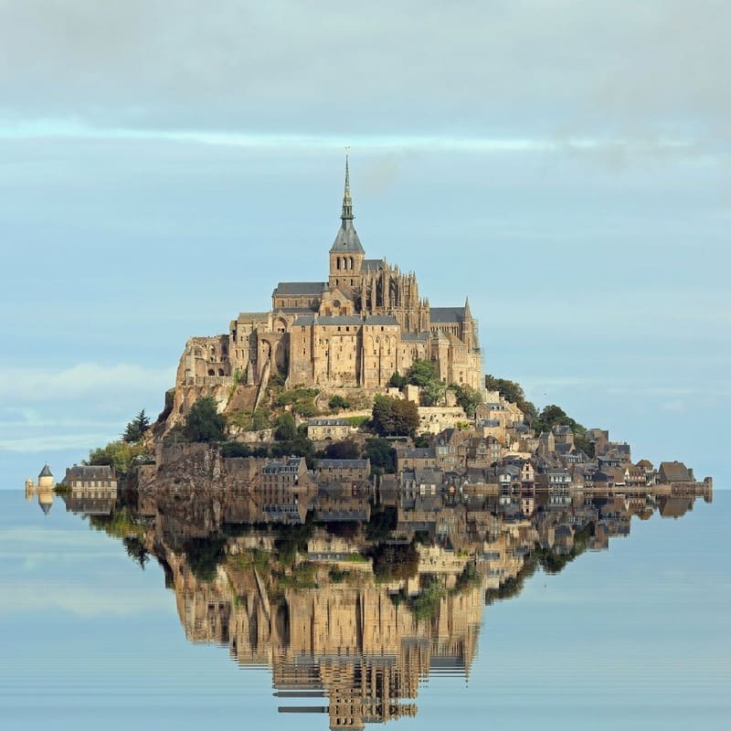 Mont Saint Michel Surrounded By Water During High Tide, France