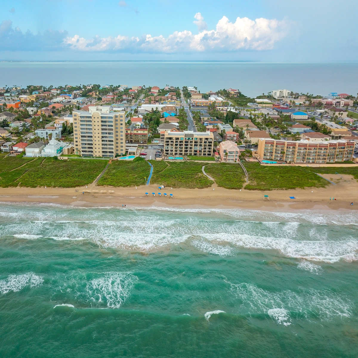 Blue waters rushing South Padre's shores