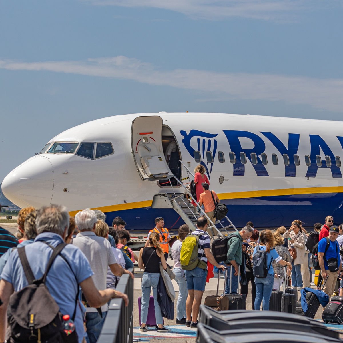 Travelers boarding Ryanair plane