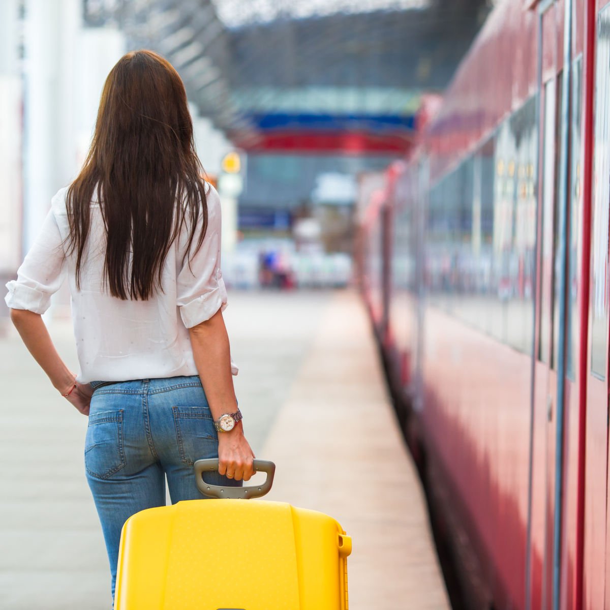 Woman Boarding A Train