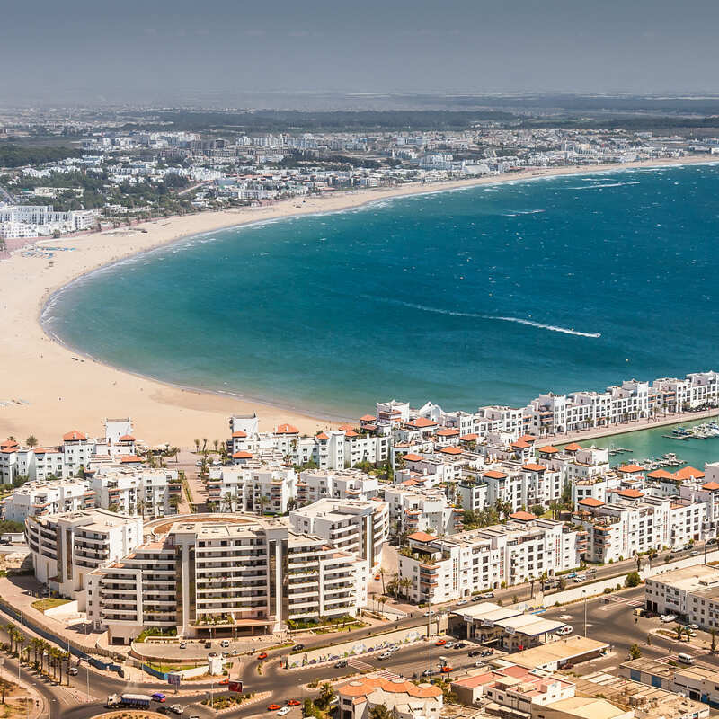 Aerial View Of A Development Zone In Agadir, A Coastal Resort In Morocco, North Africa, Facing The Azure Atlantic Ocean