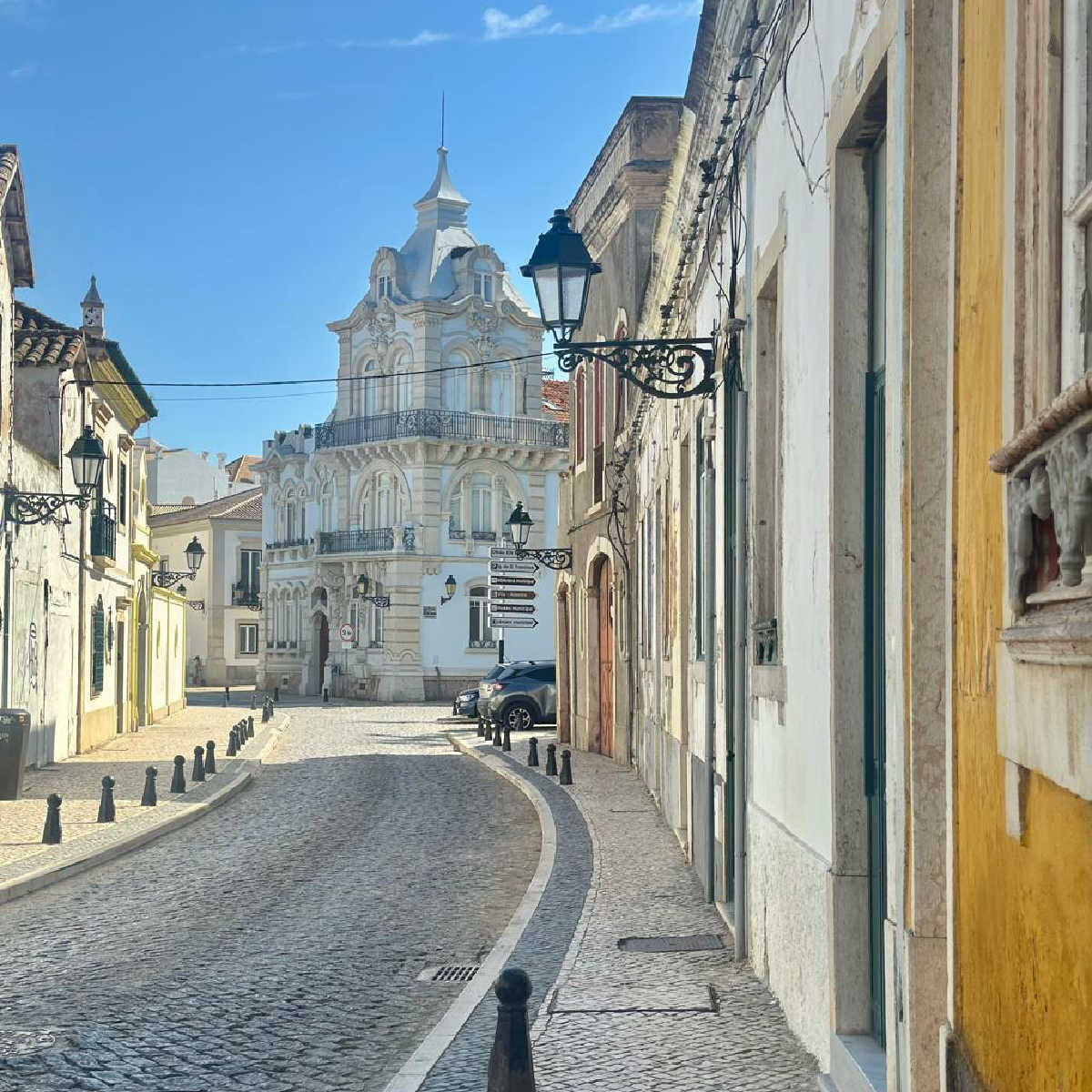 Cobbled street leading to cathedral in Faro