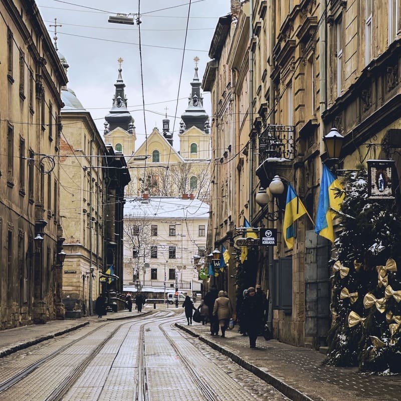 Historic Old Town Lviv Street Lined With Ukrainain Flags In Ukraine