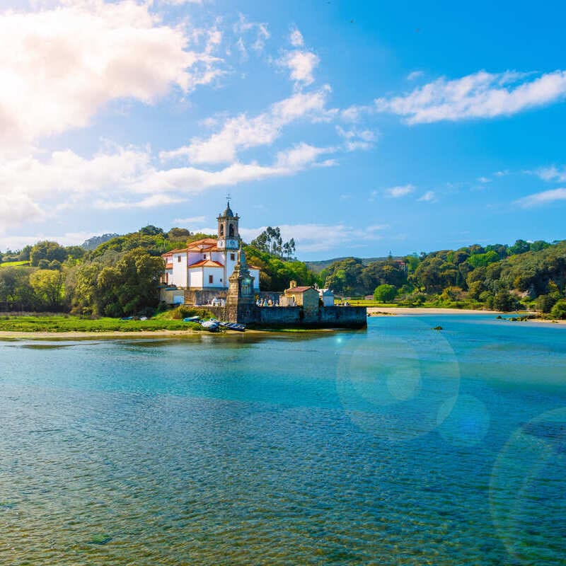 Picturesque Lakeside Church Of Niembru In Asturias, Spain