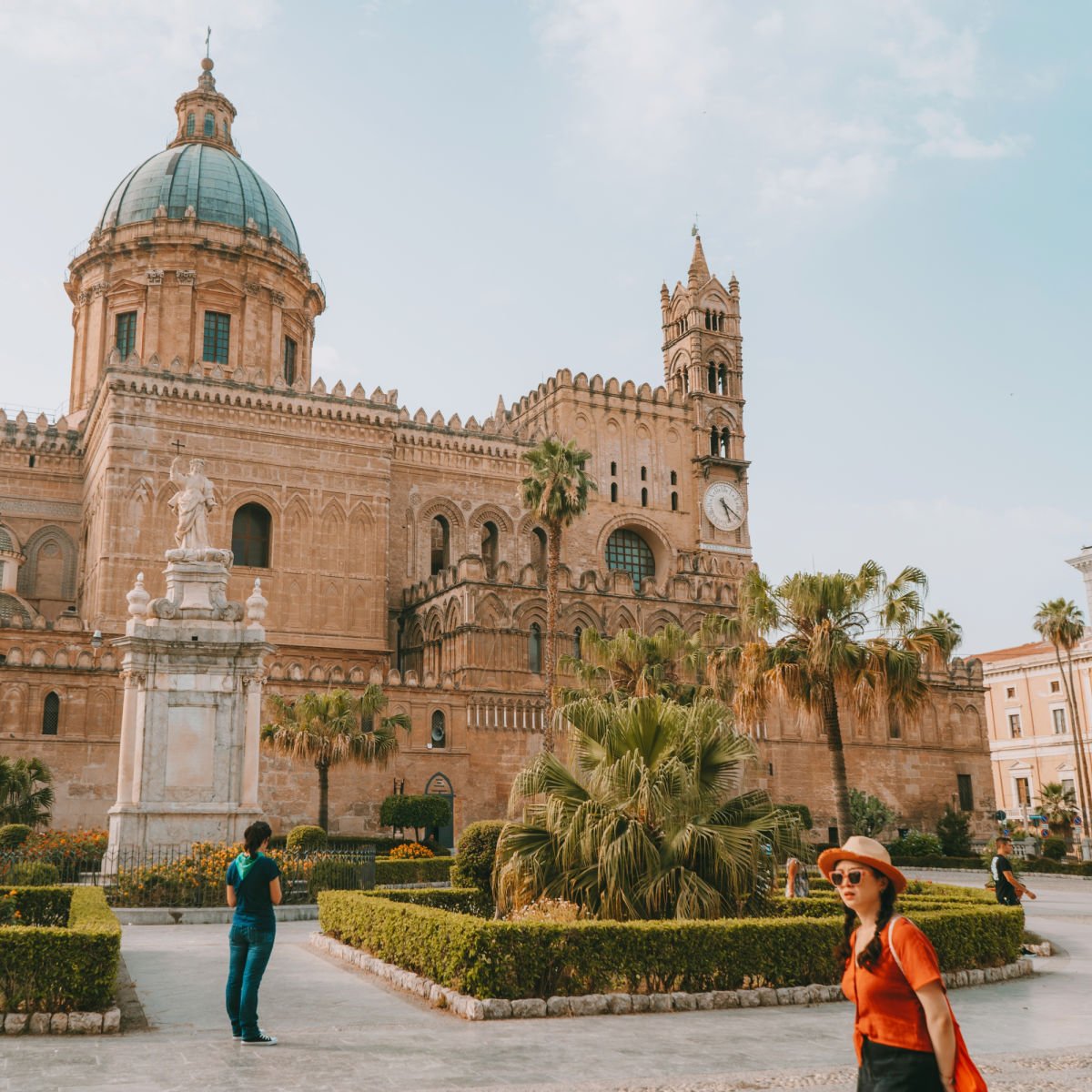 Tourists exploring Palermo's historic sites