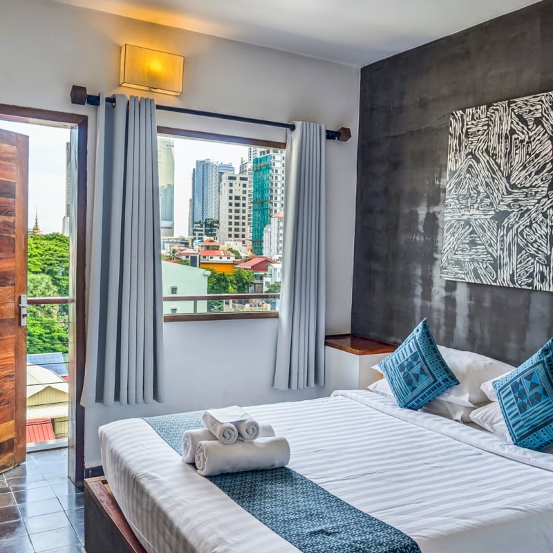 Upscale hotel room with city views in Phnom Penh, Cambodia