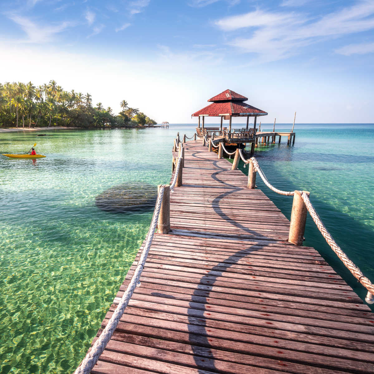 Wooden pier above Koh Kood's crystalline waters