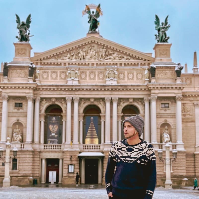 Young Man Posing Before The National Opera In Lviv, Ukraine