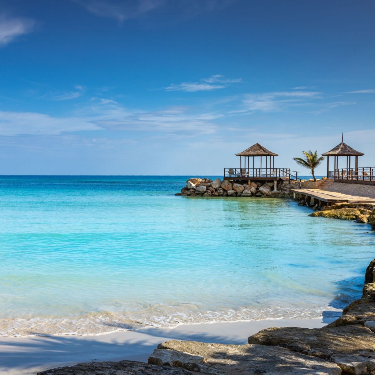 idyllic caribbean beach with pier and gazebo, Montego Bay, Jamaica