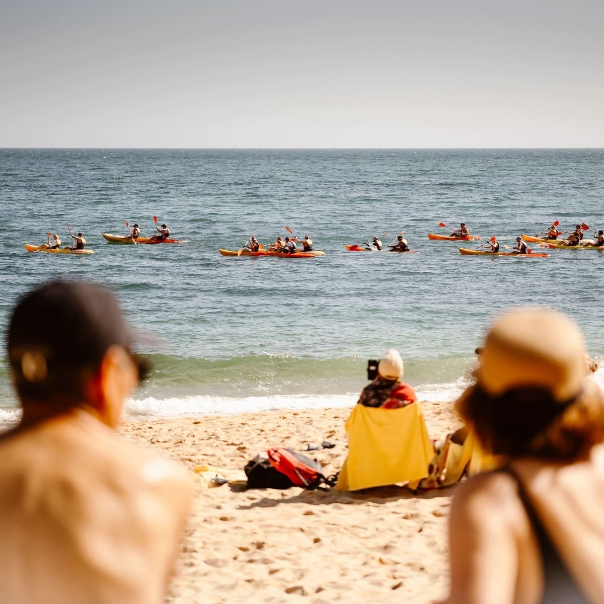 A Couple Lying At The Beach In Albufeira, Portugal