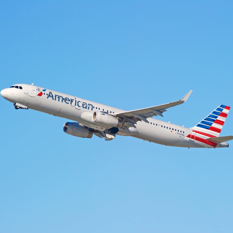 American Airlines plane in blue sky