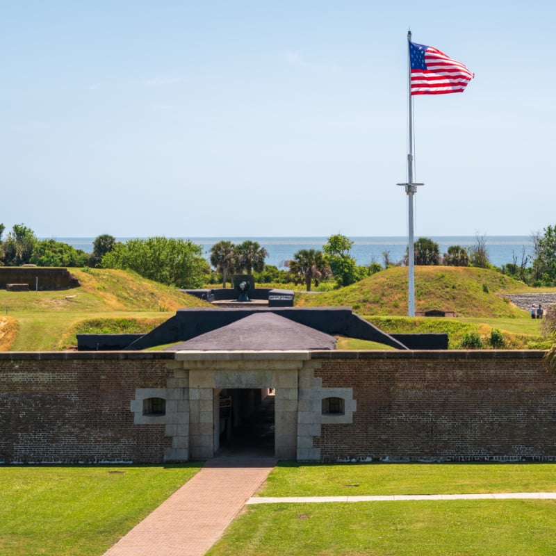 American flag waving over Fort Moultrie