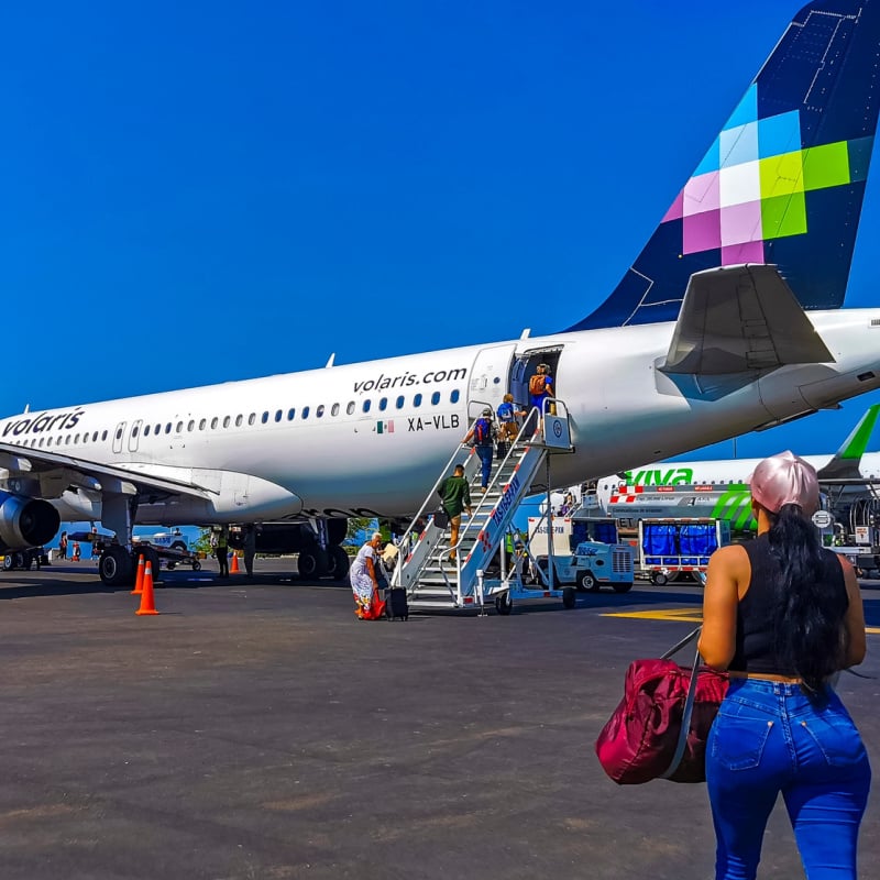 Passengers boarding Volaris flight