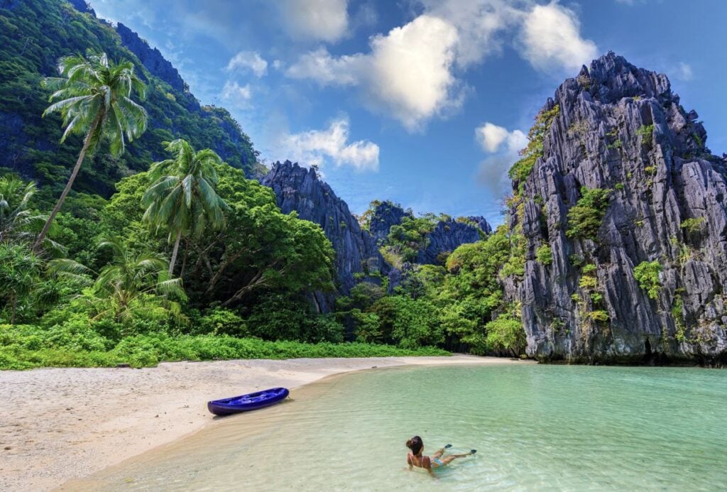 Woman in Water on Island in Philippines