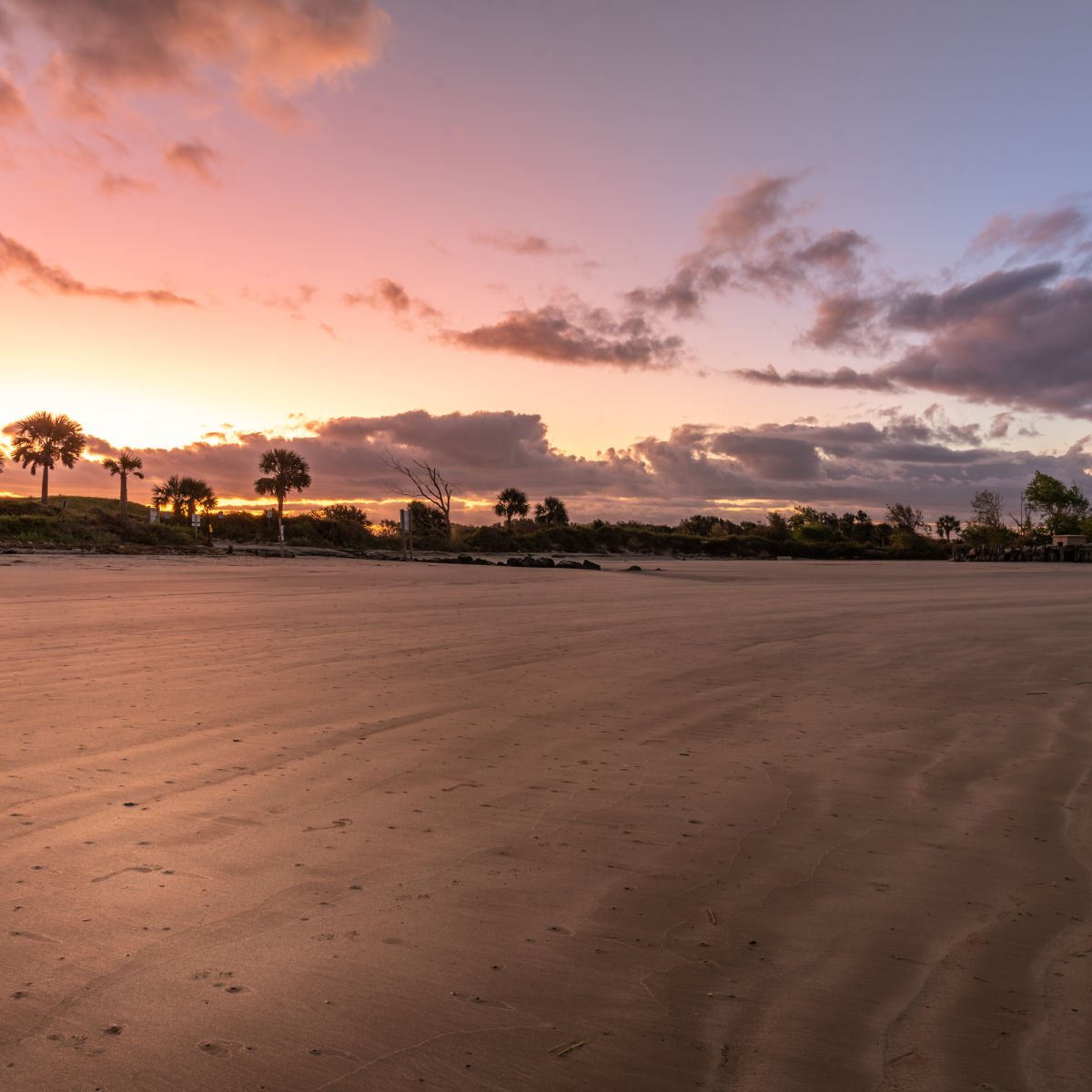 Sunrise at Sullivan's Island Beach with low tide