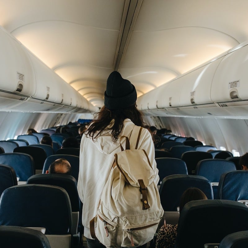 Woman Boarding A Plane