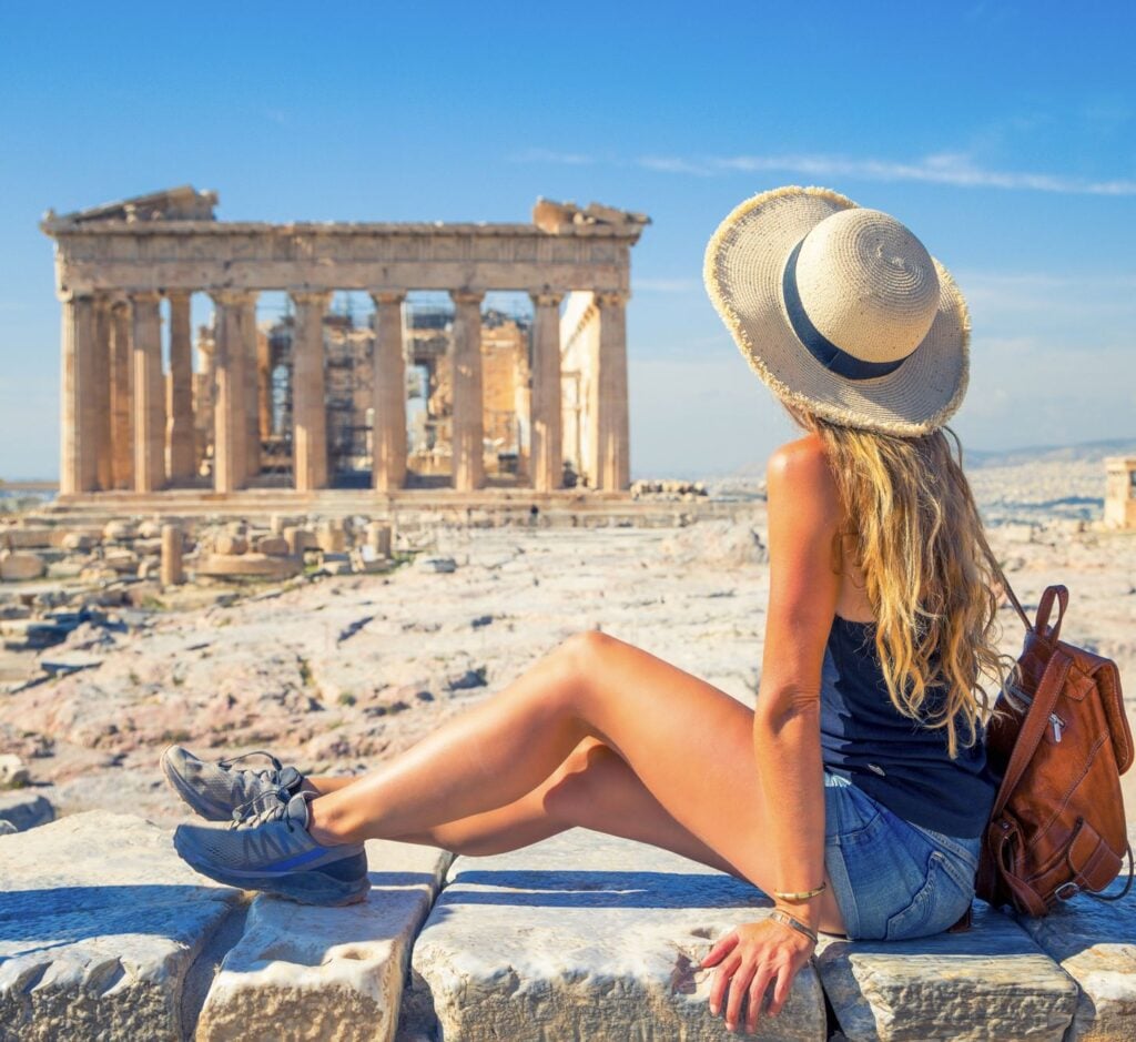 Woman looking at the acropolis in Greece