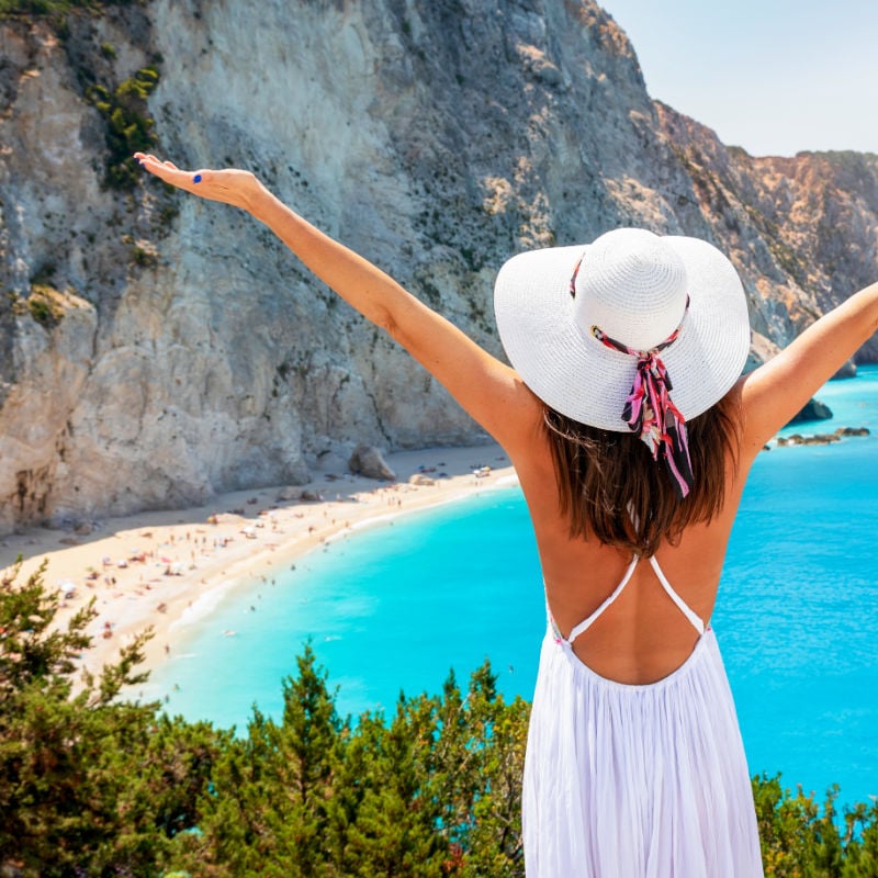 Woman overlooking Porto Katsiki, Lefkada, Greece