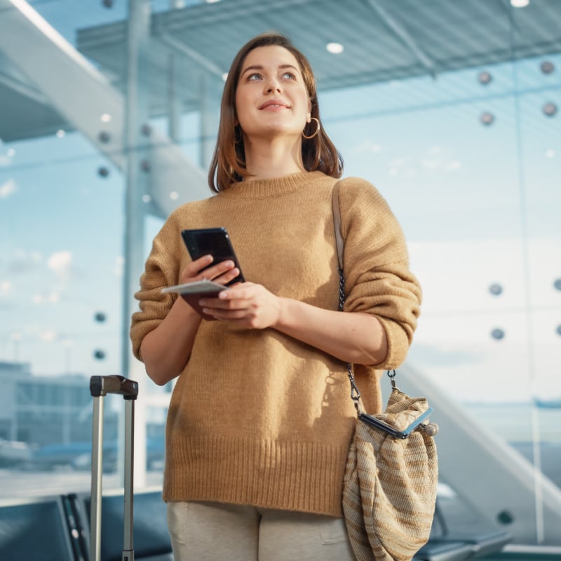 Woman standing in an airport