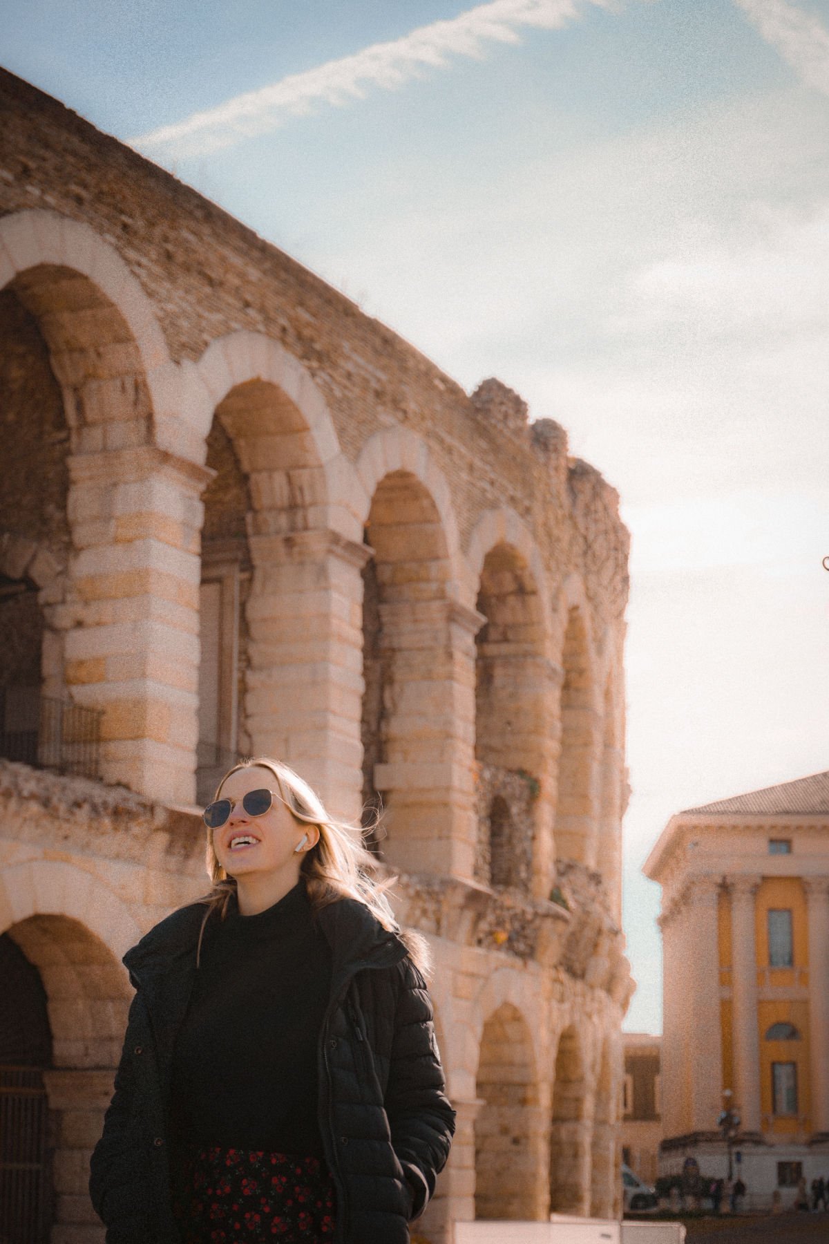 Woman standing in front of Arena in Verona