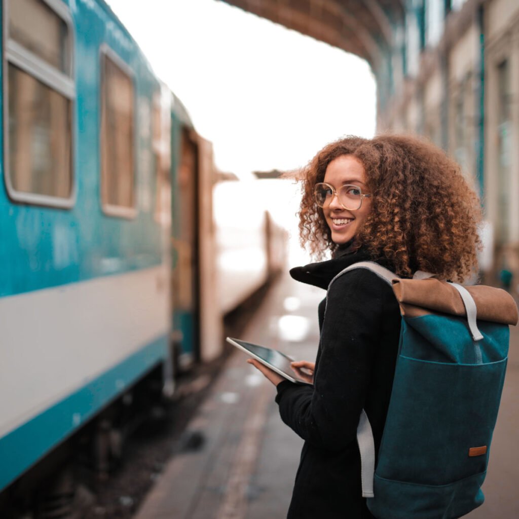 Young Traveler At Train Station In Winter