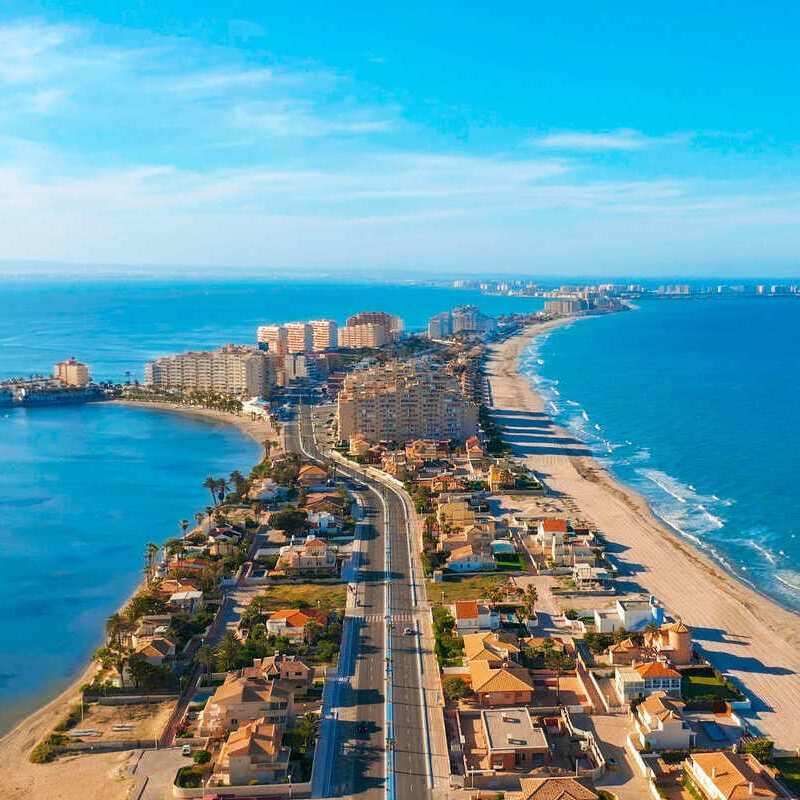 Aerial View Of La Manga, A Natural Spit In Murcia Dividing The Minor Sea From The Mediterranean, Southern Spain, Iberian Europe