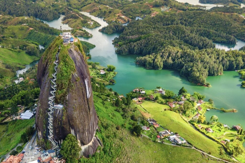 El penol (large rock mountain) overlooking green lakes and lush forest in Colombia