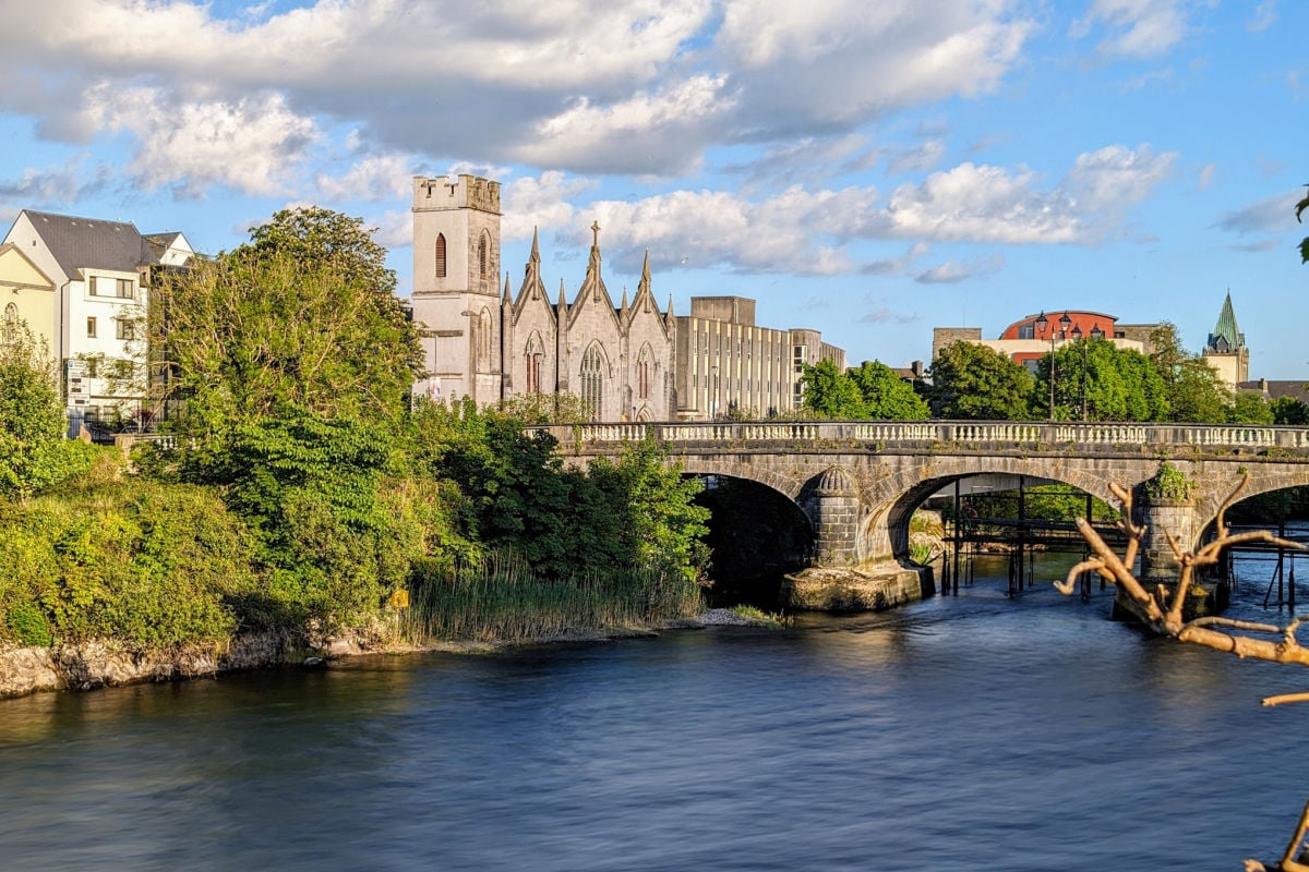 Historic buildings along river in Galway, Ireland